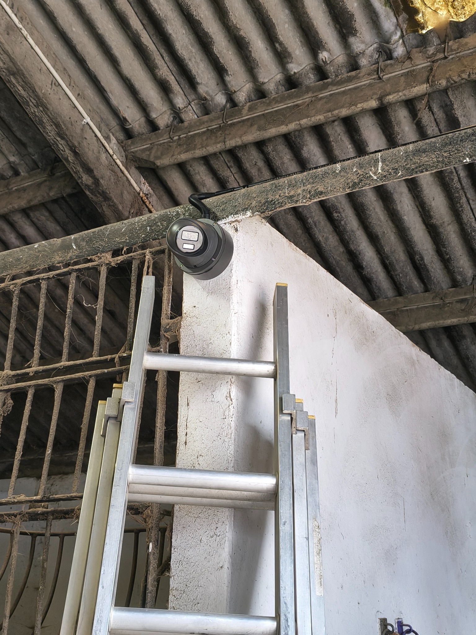 CCTV camera mounted inside a warehouse